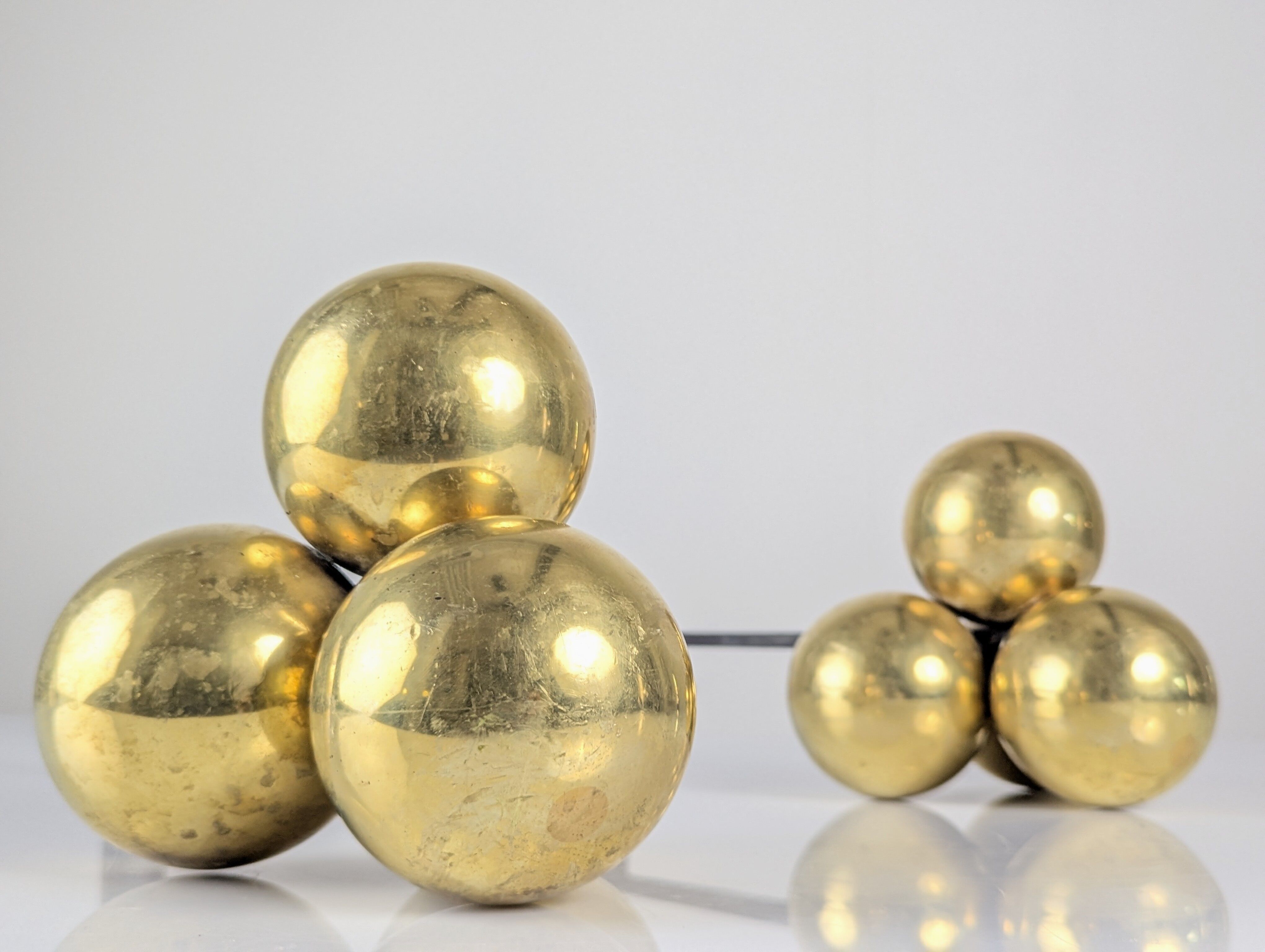 Bronze and wrought iron andirons by Jacques Adnet, 1930s