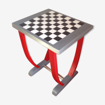 Table chess board with pieces of wood painted black and silver