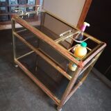 Brass and smoked glass bar trolley with casters