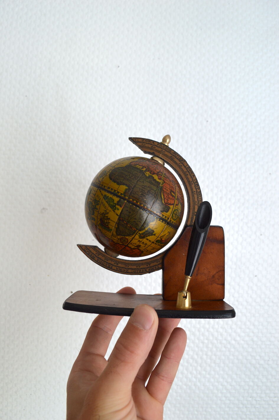 Italian globe feather holder