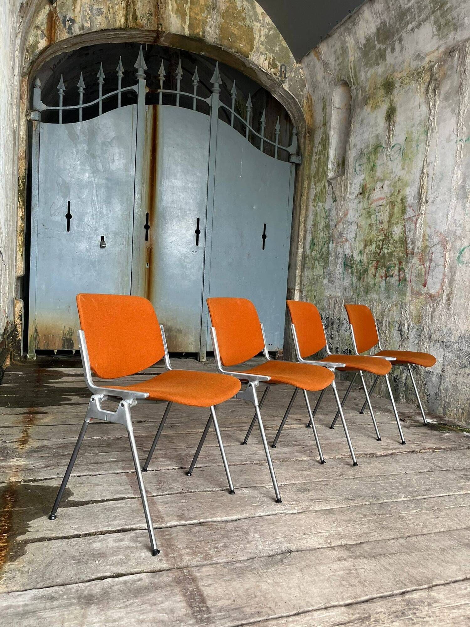 DSC 106 chair in orange by Giancarlo Piretti for Castelli, 1970s.