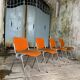 DSC 106 chair in orange by Giancarlo Piretti for Castelli, 1970s.
