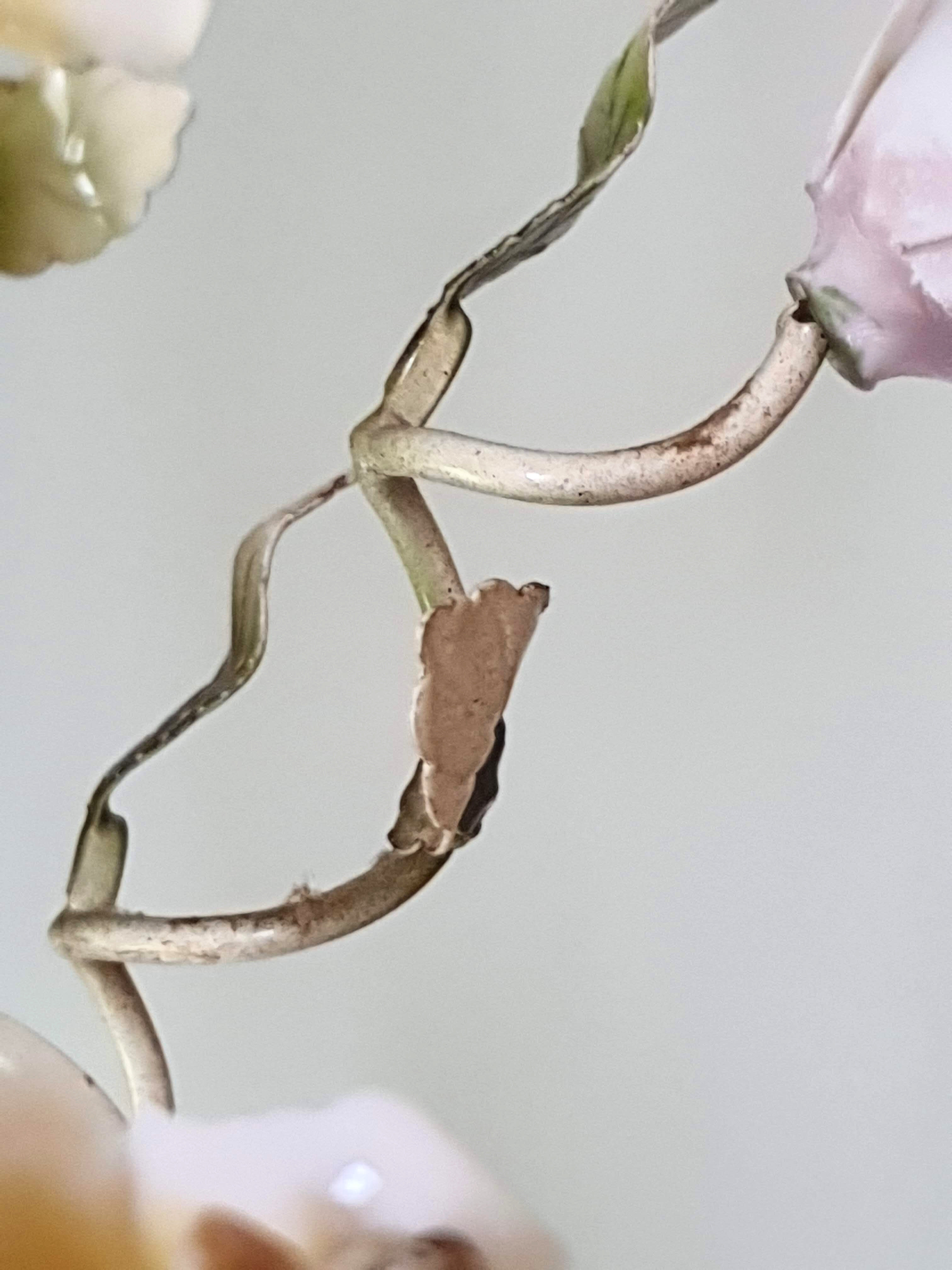 Painted metal chandelier and porcelain flowers