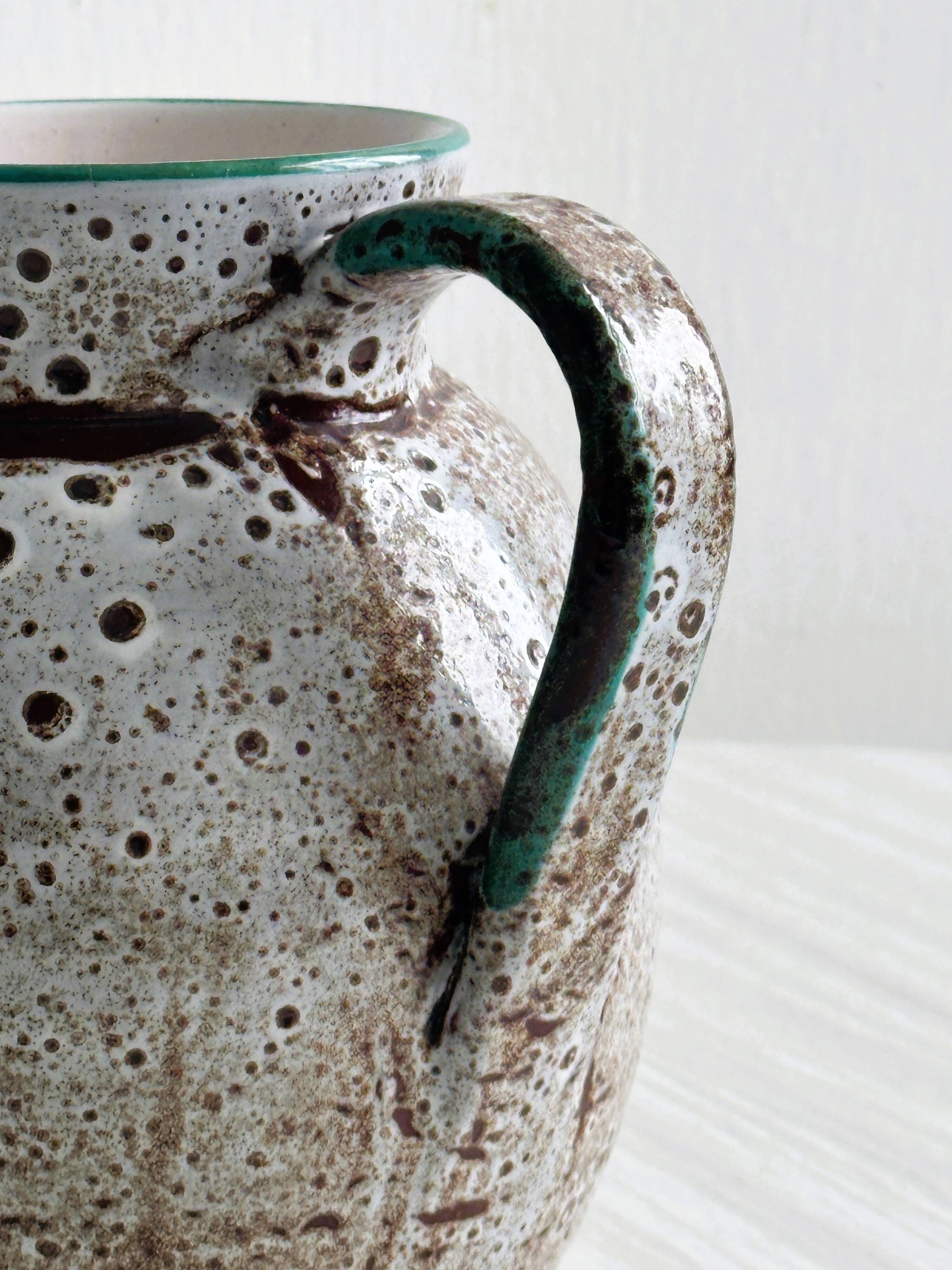 Antique decorative pitcher in French ceramic