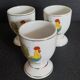Porcelain egg cups with rooster decoration, set of three