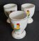 Porcelain egg cups with rooster decoration, set of three