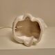 White ceramic table lamp, an elephant holding a lighted ball