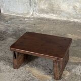 Small auxiliary stool in upcycled teak with traces of green chrome on the leg.