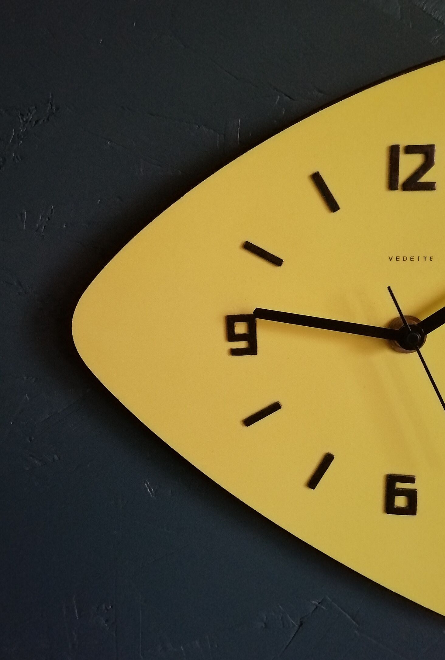 Formica vintage asymmetrical silent wall clock "Yellow Star"