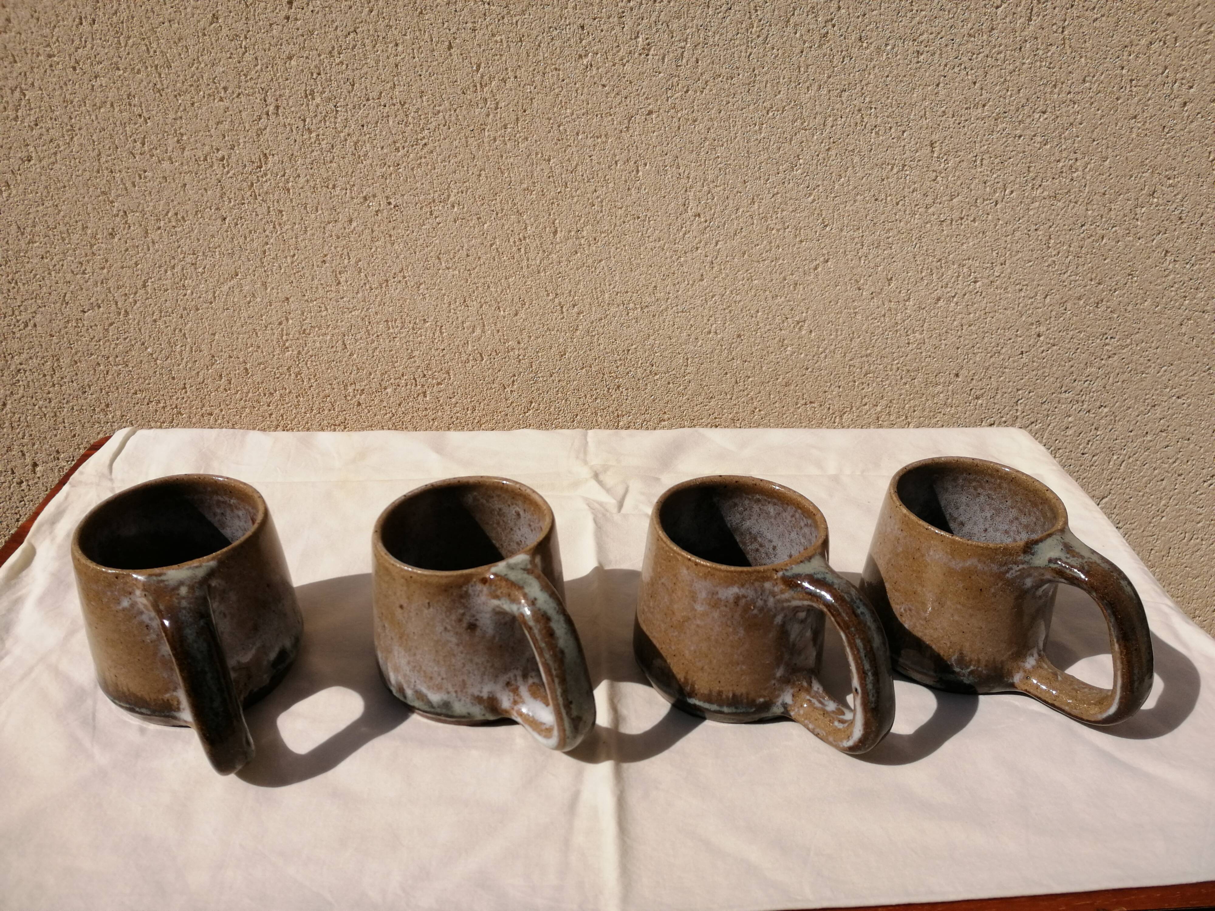 Lot of 4 sandstone glasses