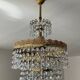 Chandelier with crystal and brass pendants