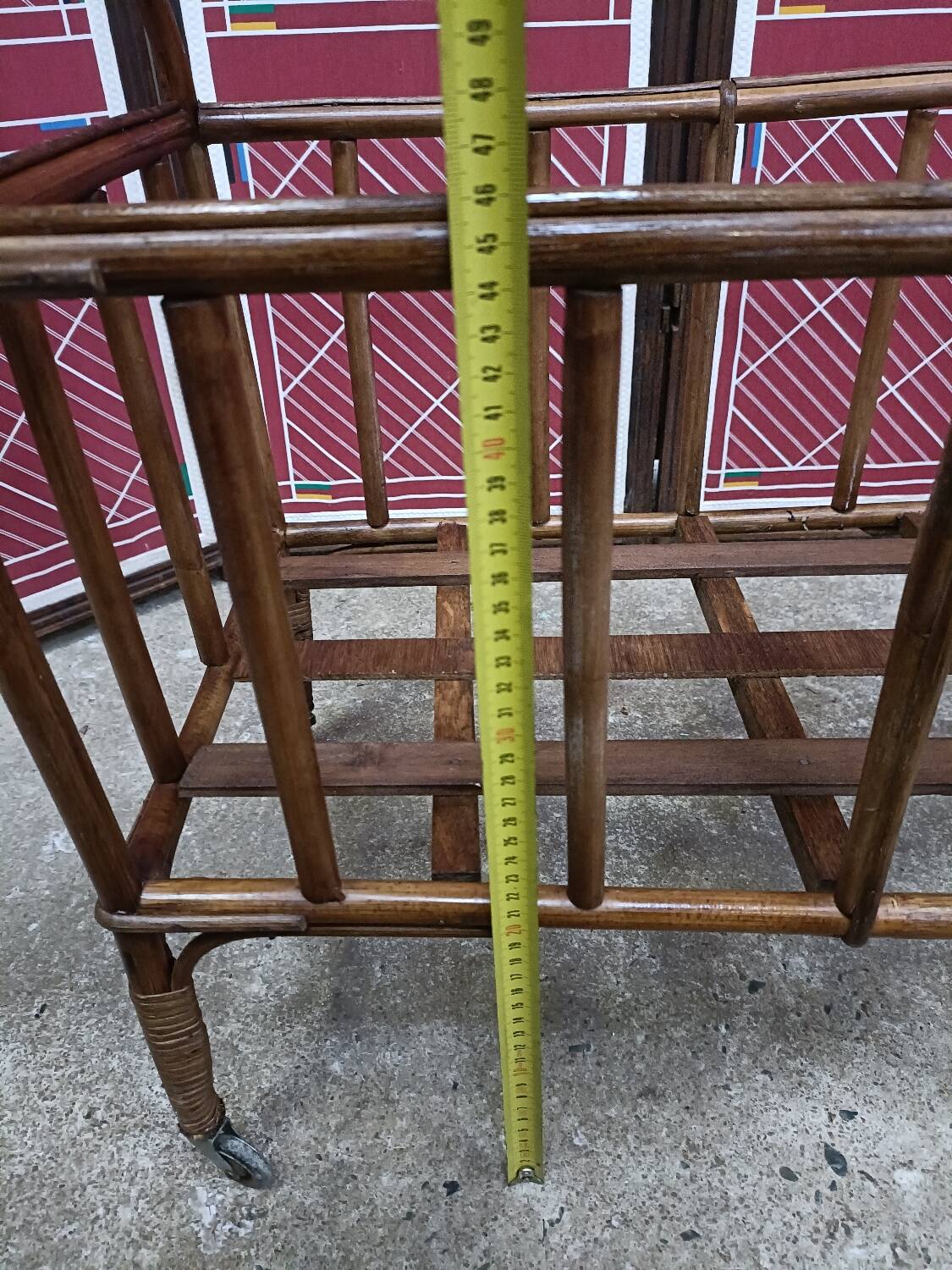 Old small bed or cradle for baby in vintage rattan