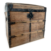 Antique 19th-century domed trunk in wood with riveted fittings.