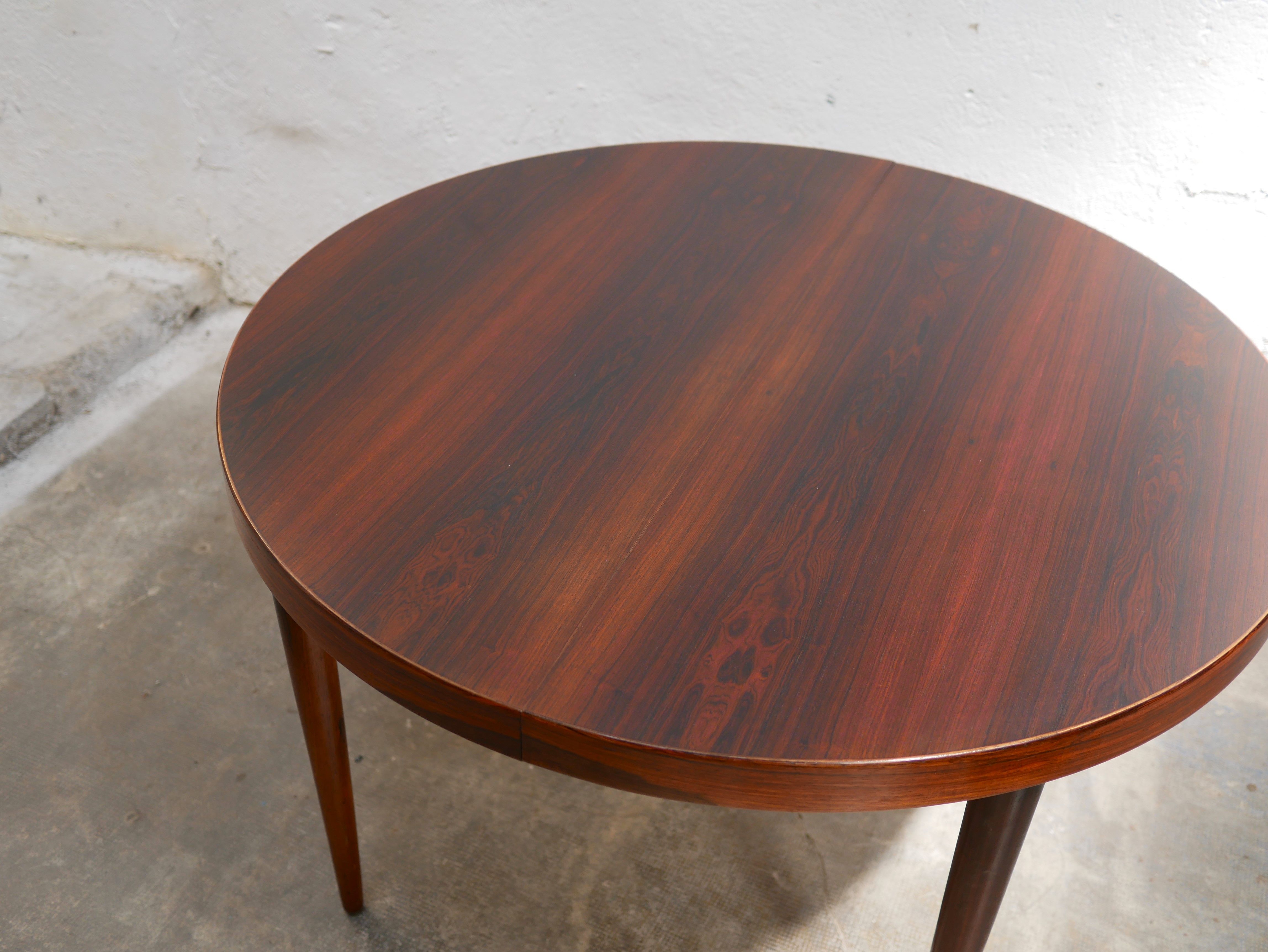 Vintage rosewood extendable Scandinavian round table by Kai Kristiansen for Skovmand and Anders