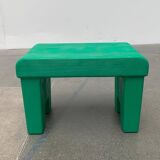 Postmodern plastic stool with a wood effect.