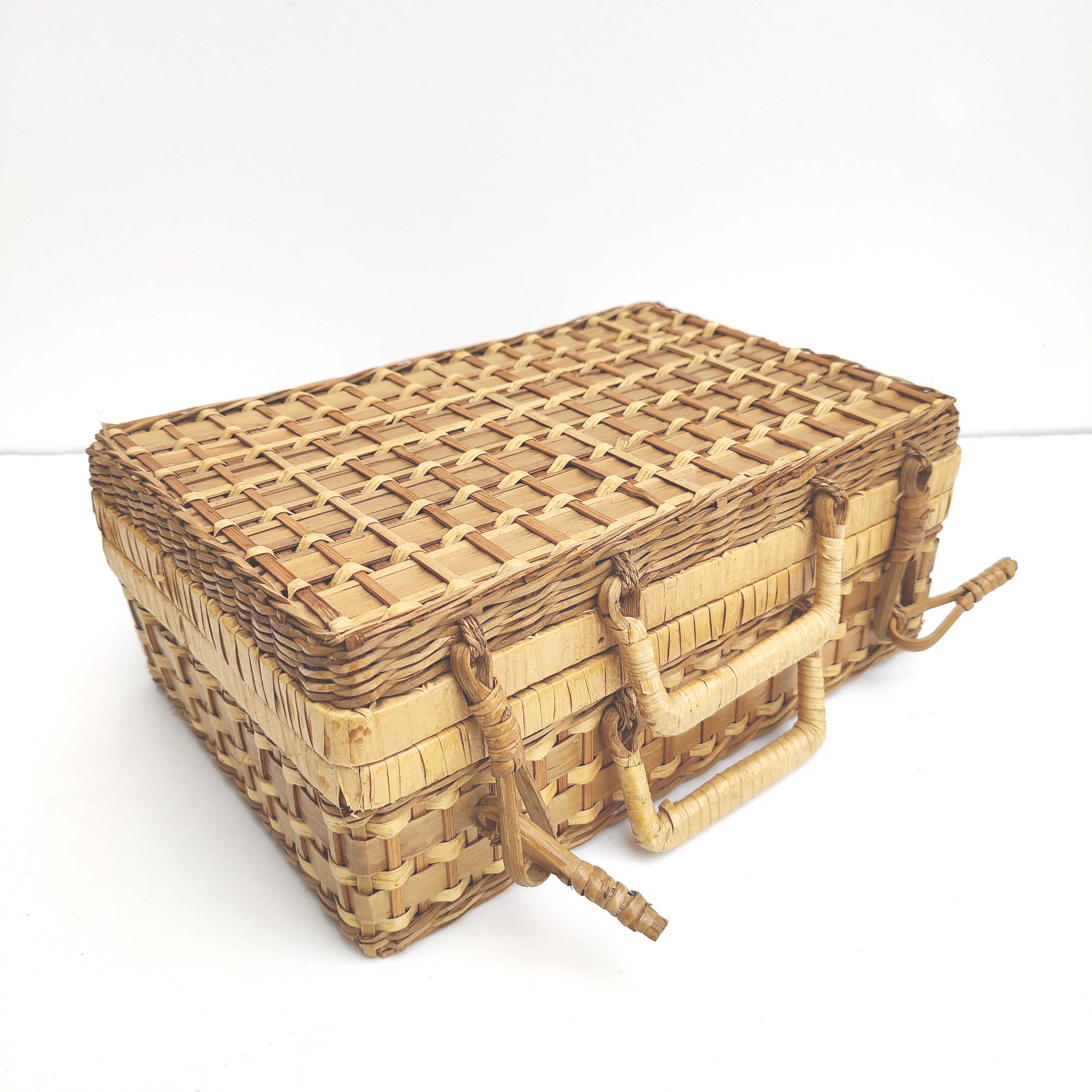 Vintage wicker nesting suitcases