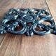 Old dish bottoms in black cast iron