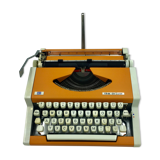 WE typewriter orange