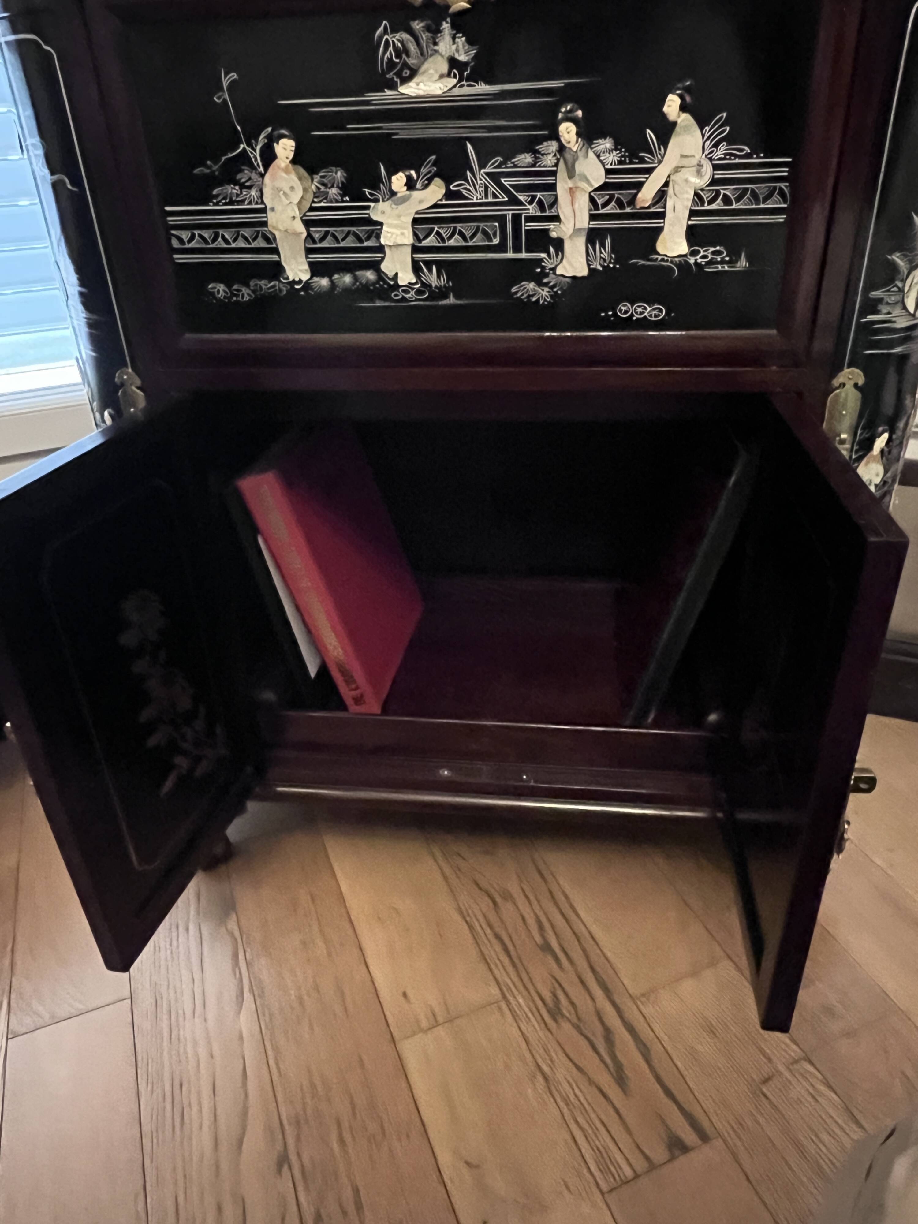 "Chinese black lacquer cabinet, mother-of-pearl inlays, court scenes"