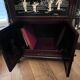 "Chinese black lacquer cabinet, mother-of-pearl inlays, court scenes"