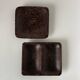 Set of two small trays or catchalls in Art Deco style made of palm wood.