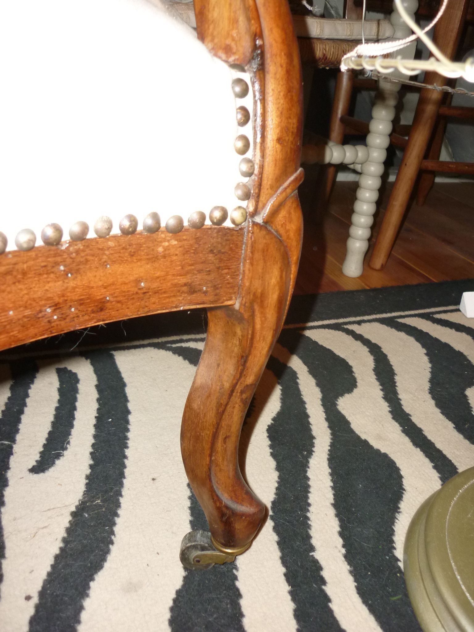 Armchair and its footrest