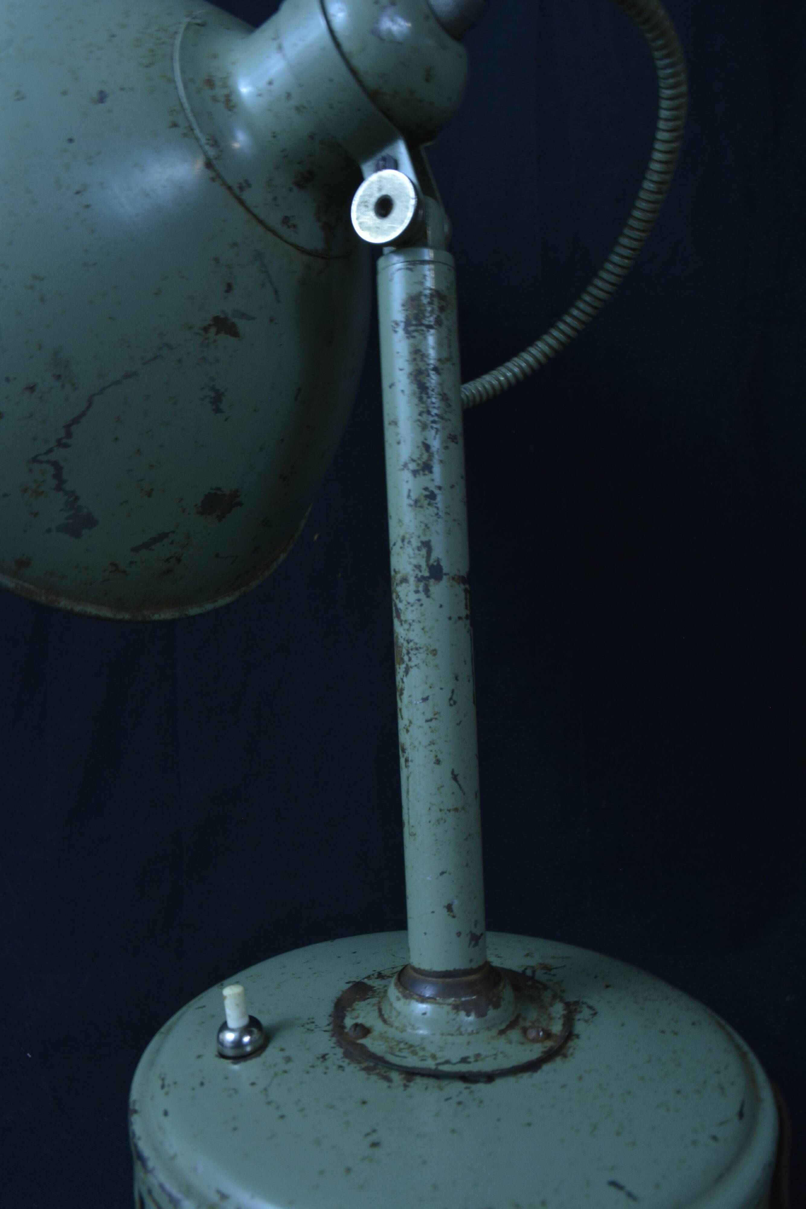 Industrial metal parabola lamp.