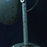 Industrial metal parabola lamp.