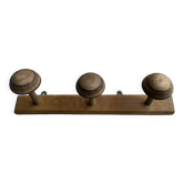 Old wooden wall coat rack