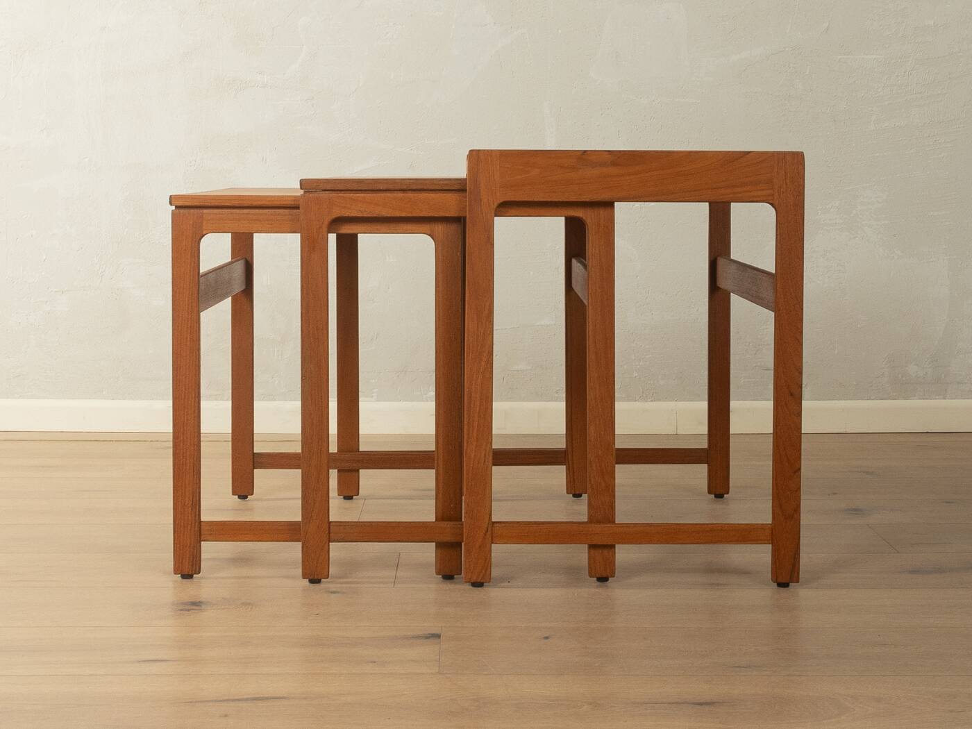 Elegant set of three nesting tables made of teak