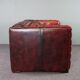 Chesterfield sofa in red cowhide leather, 2.5 seats