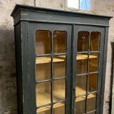 Former black patinated showcase