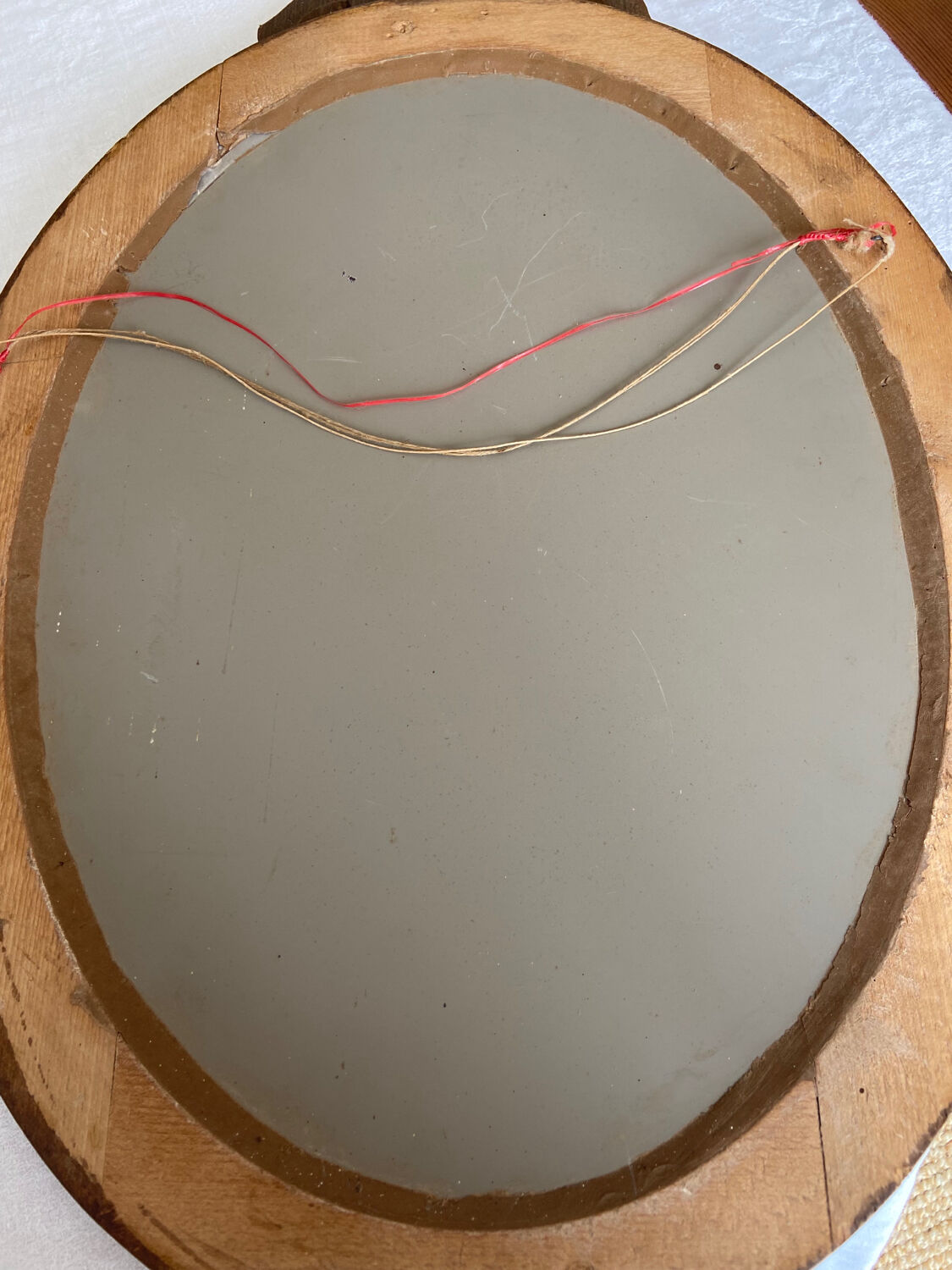 Louis XVI style oval knot mirror