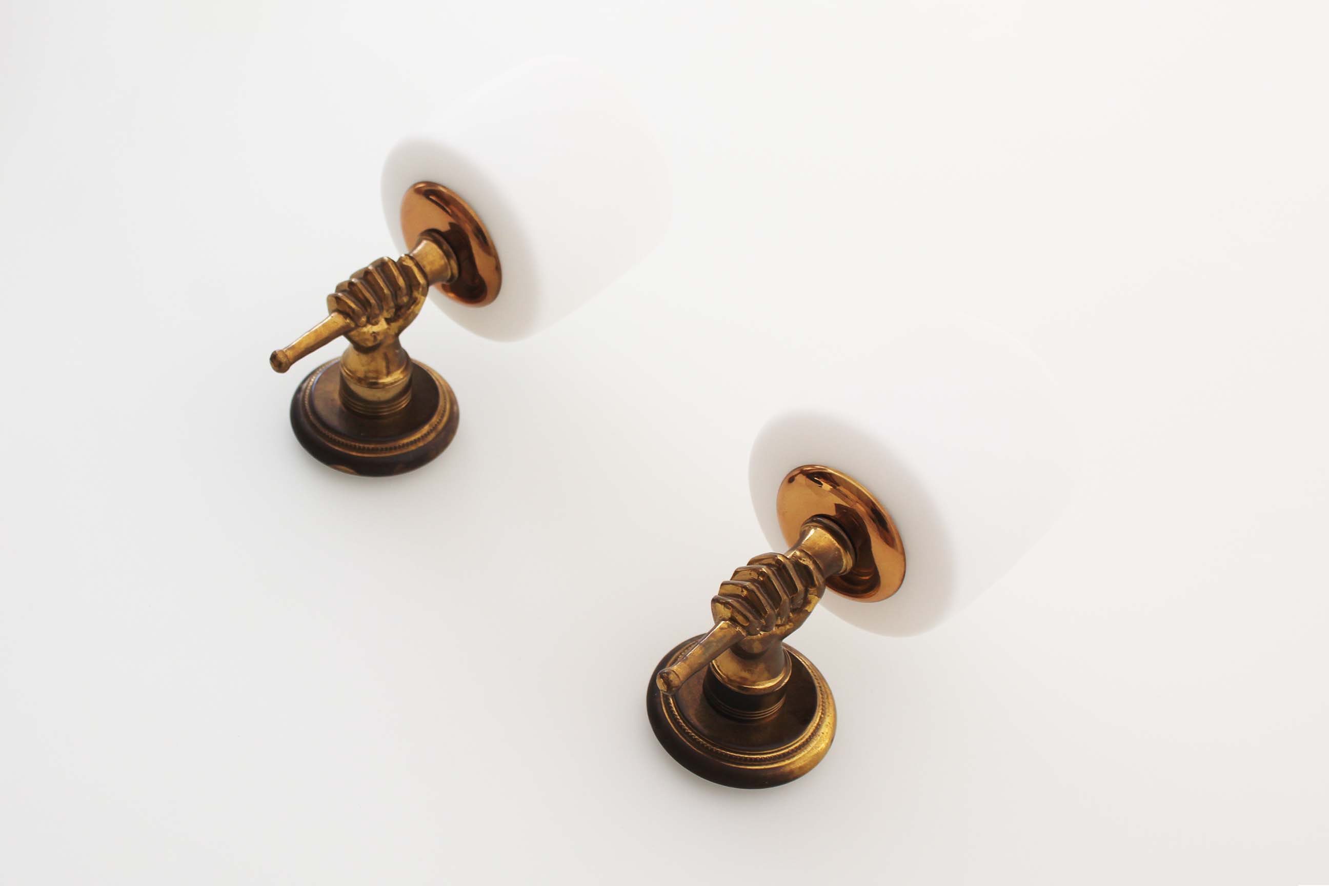 Pair of 1950’s solid brass ‘torch holding hand’ wall sconces by maison arlus