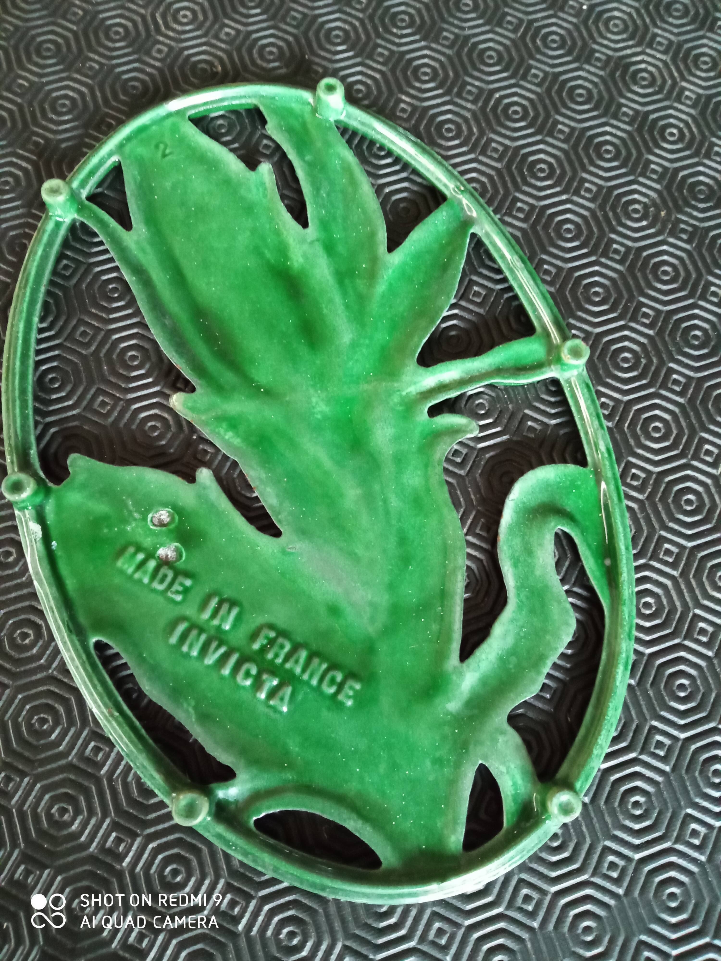 Vintage Invicta trivet in cast iron