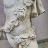Antique reconstituted stone planter depicting a cherub