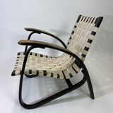 Vintage black lounge chair by Jan Vaněk