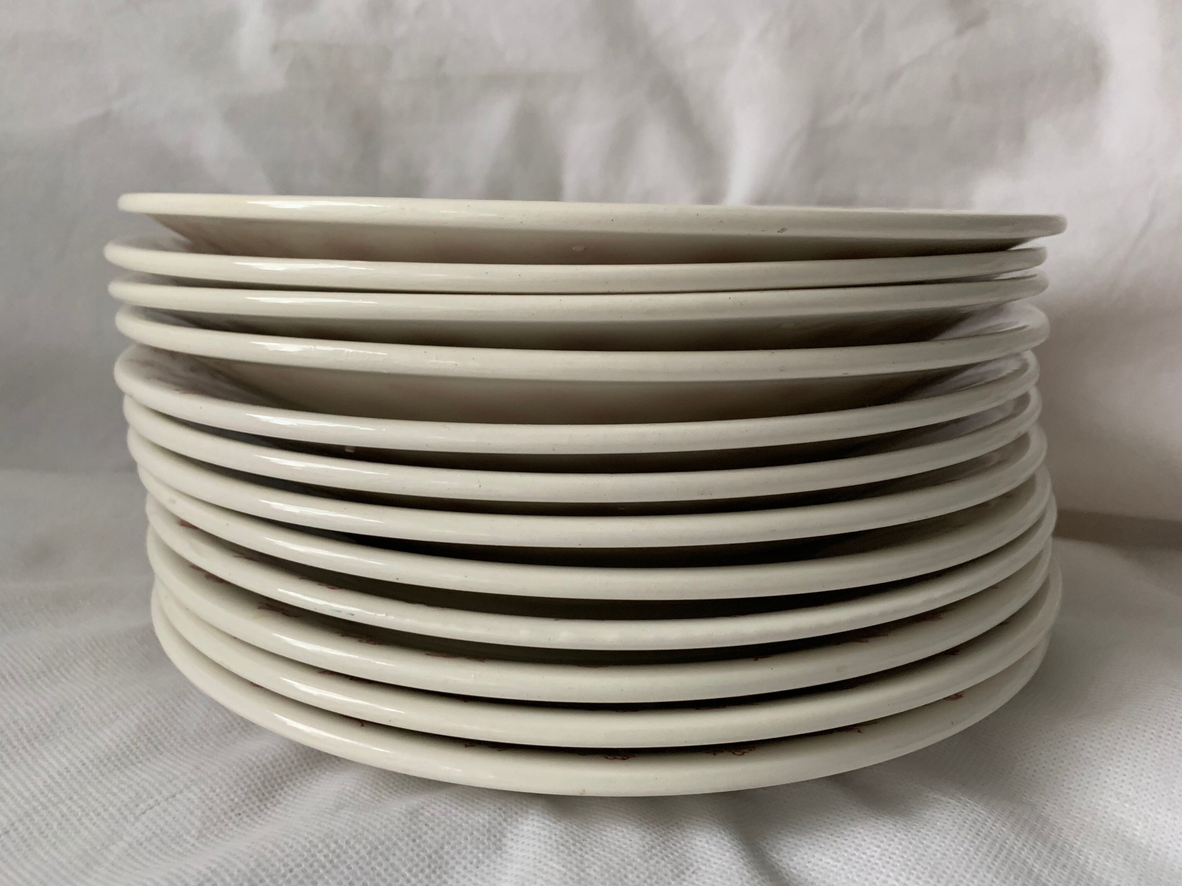 12 flat plates in red earthenware Gien 1970