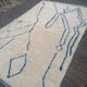 Moroccan Berber carpet Beni Ouarain with blue patterns 200x310cm