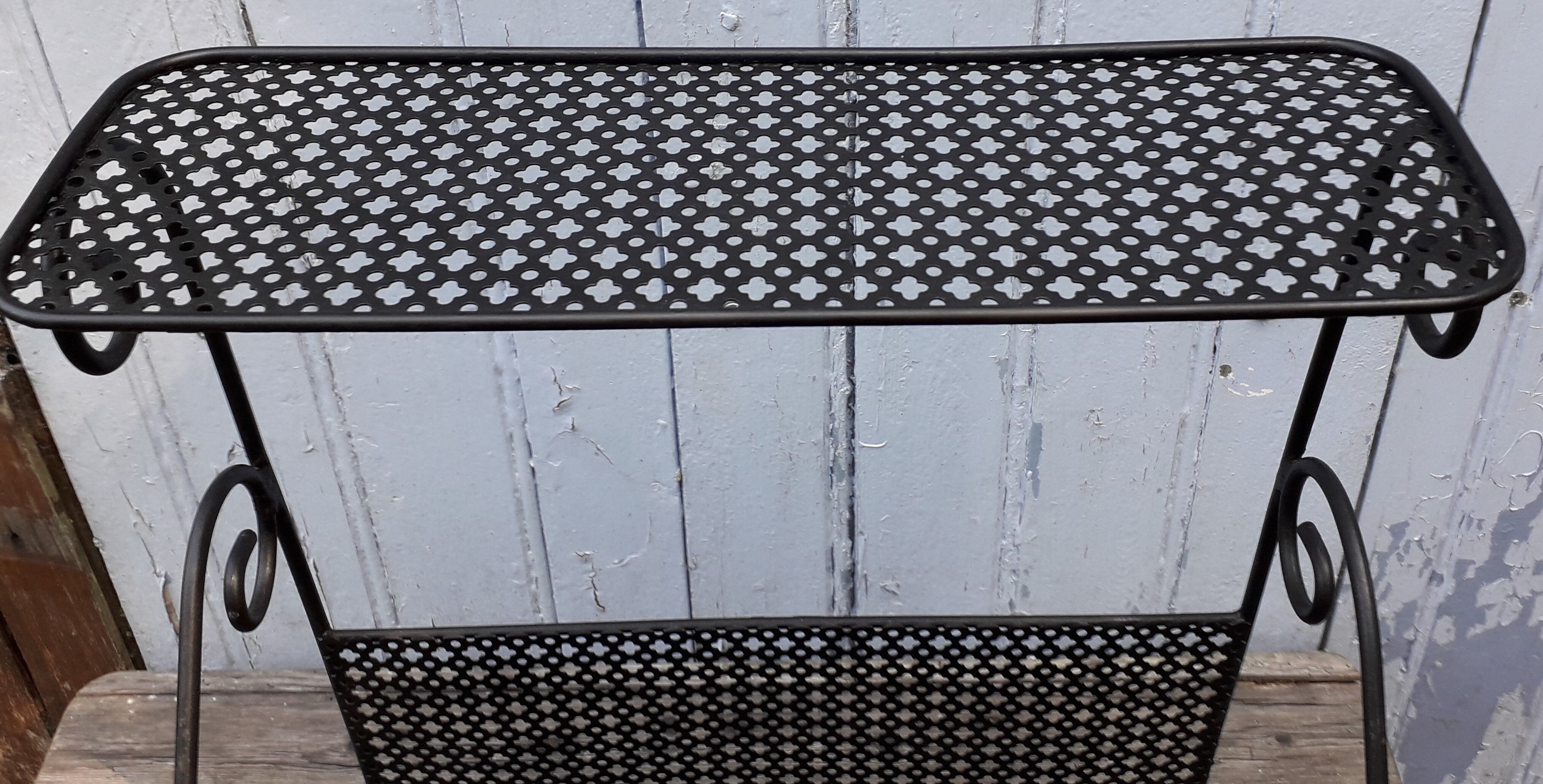 Metal magazine door
