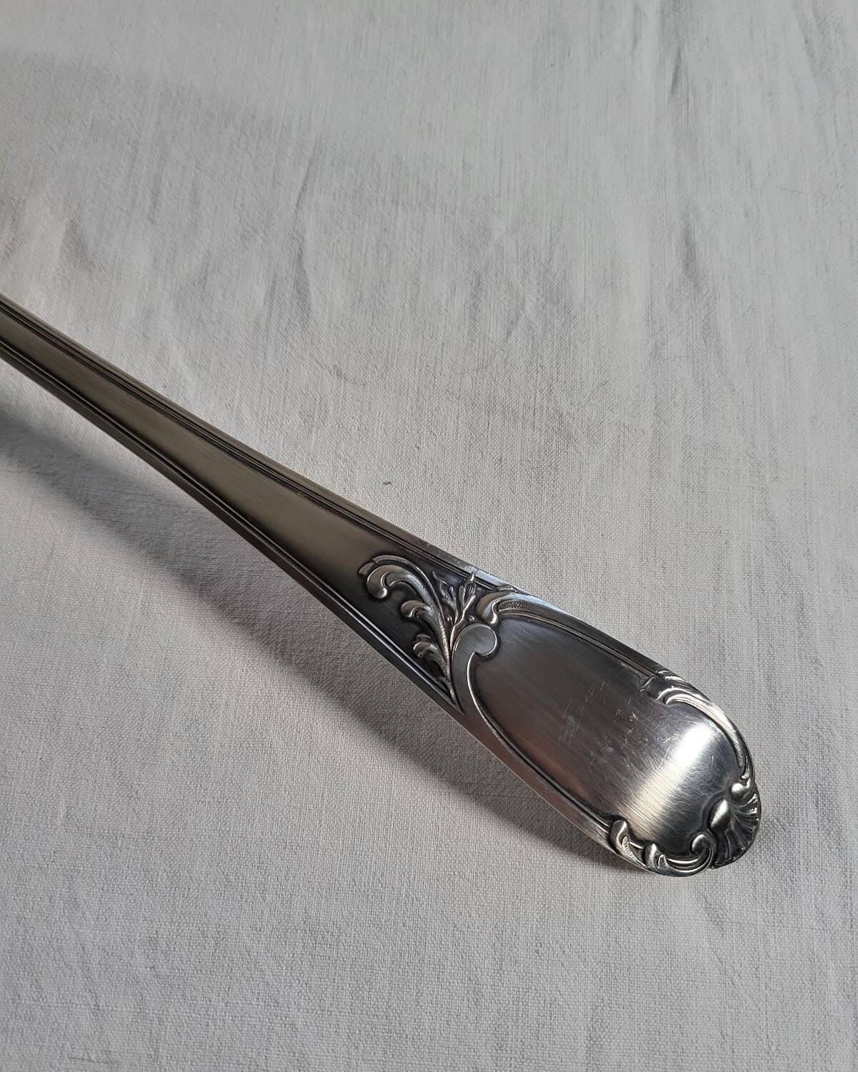 SOH silver metal ladle with shell/foliage decor