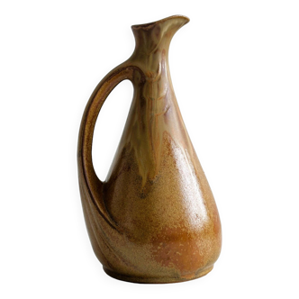 Denbac pitcher.