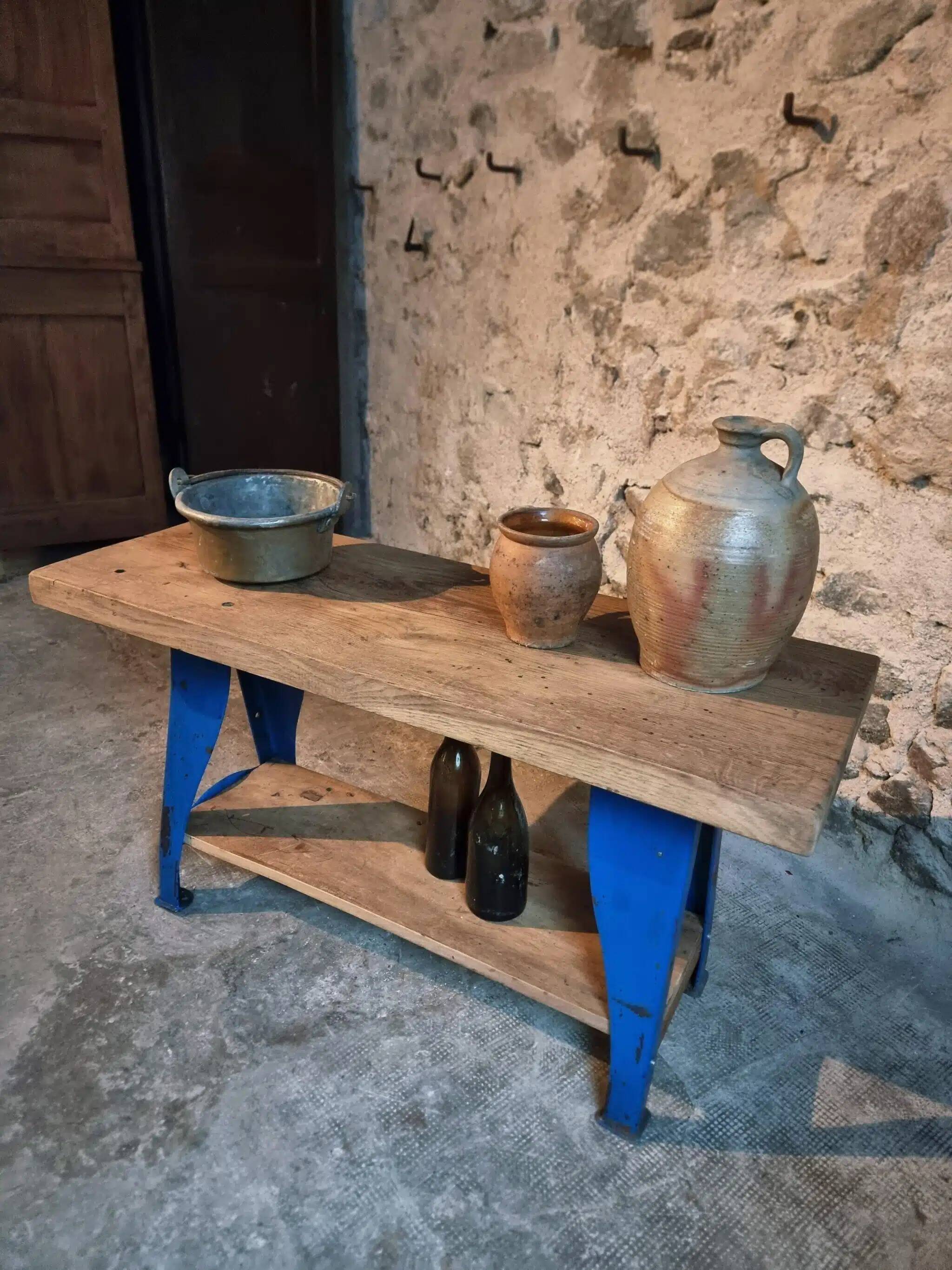 Vintage industrial workbench table with cast iron legs (Aux Forges de Vulcain)