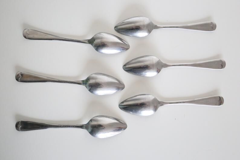 Serving small notched spoons for grapefruit