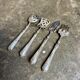 4 silver bonbon spoons engraved "HS"
