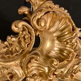 Large oval mirror in gilded wood