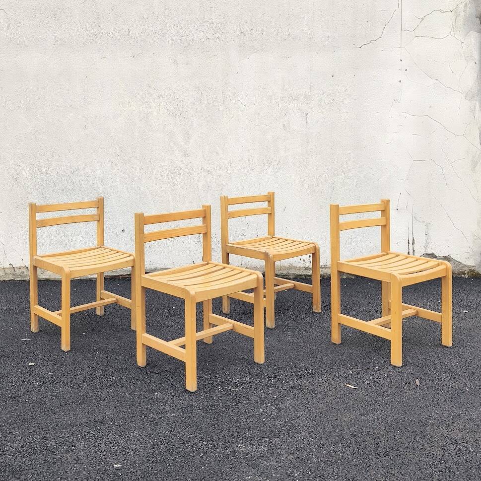 Set of 4 varnished wooden chairs, André Sornay