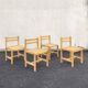 Set of 4 varnished wooden chairs, André Sornay