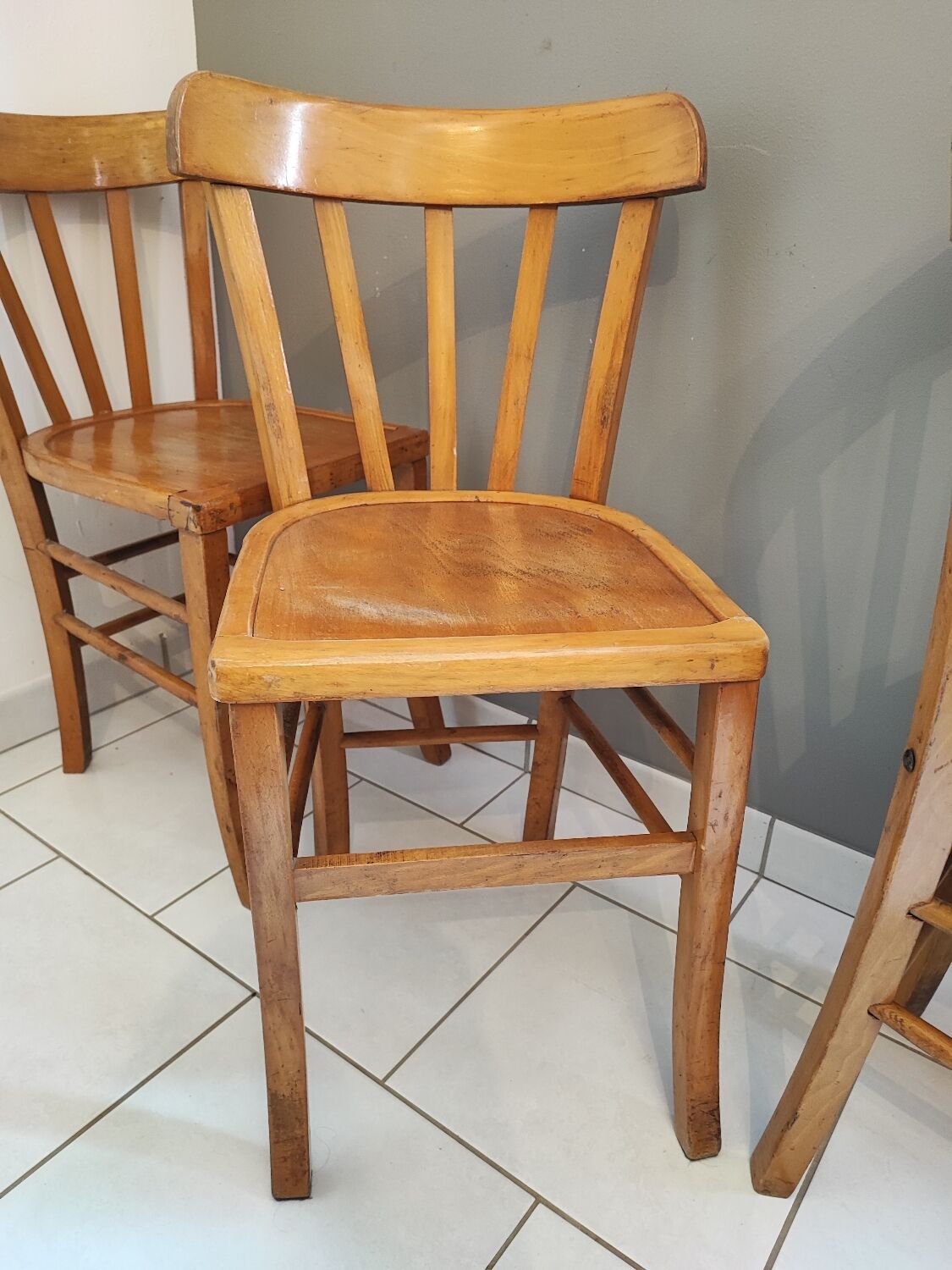 Vintage four-quarter bistro chairs