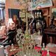 Large floral Art Nouveau chandelier in patinated bronze and metal.